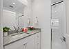 Enjoy the convenience of a walk-in shower in this well-appointed bathroom.
