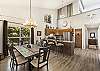 Fully equipped galley kitchen with stainless steel appliances, granite countertops.  Open to the dining area and living room. 