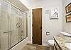 Second hall bathroom with tub/shower combo. 