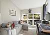 Bright office space with monitor and printer.  Perfect for remote work. 