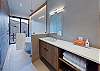 King room (downstairs) attached bath. Includes soaking tub and wet room and doors opening up onto the private patio for an 