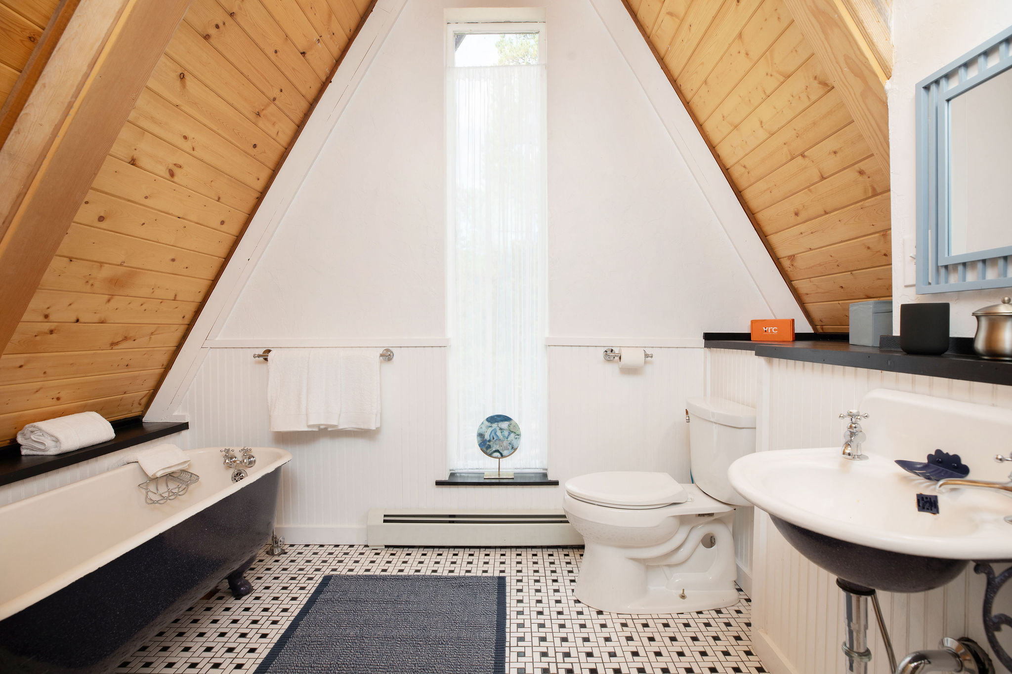 Full bathroom #2 with bathtub, toilet, and sink