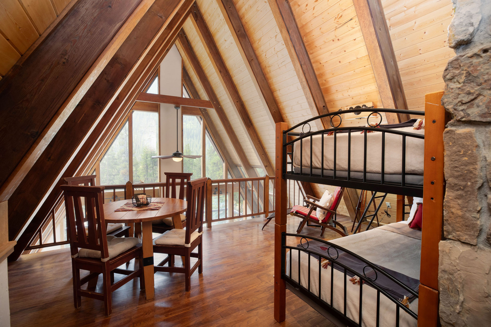 Twin over twin bunk bed in bedroom #3 with additional seating options - ideal for kids