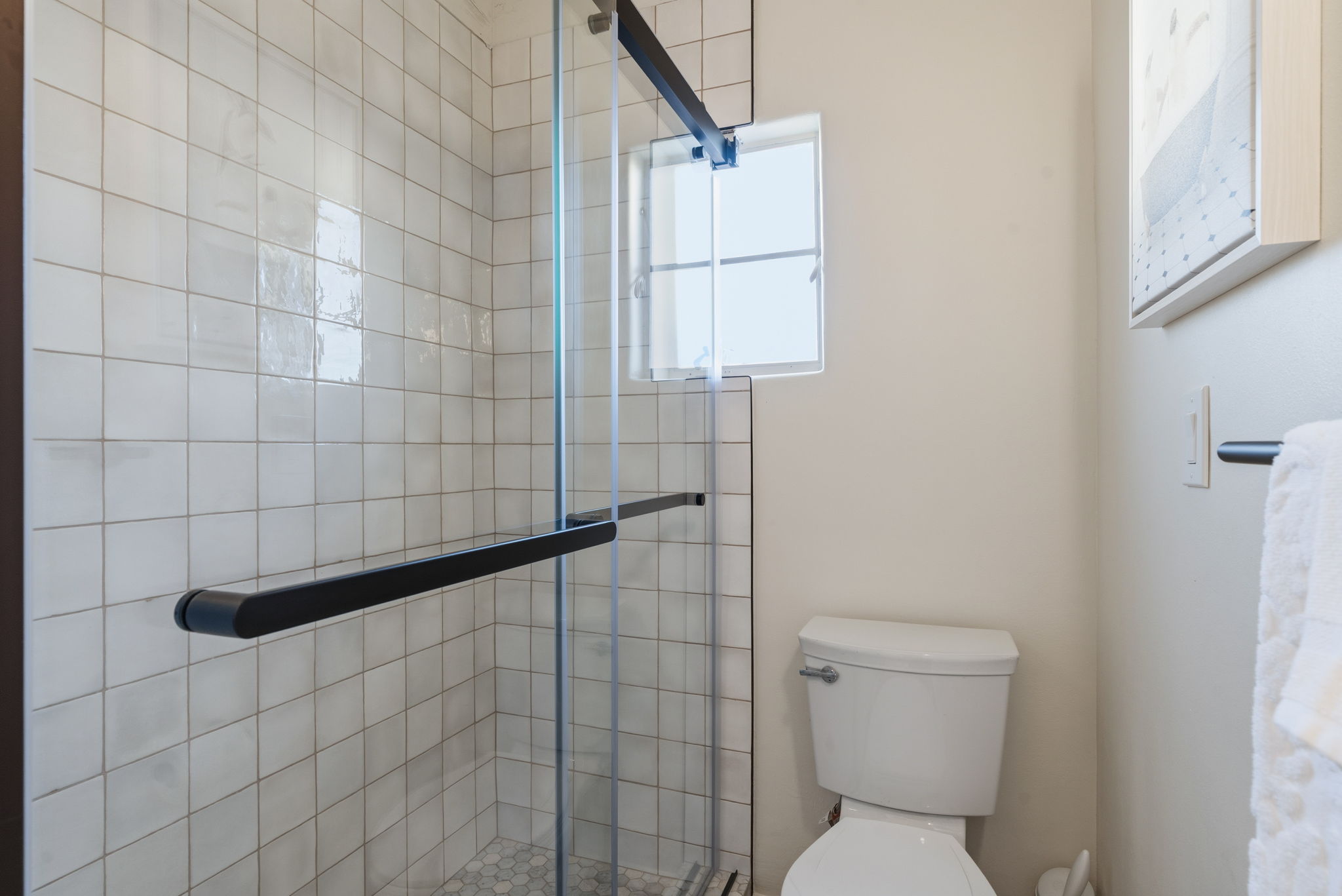 Enjoy a sleek walk-in shower