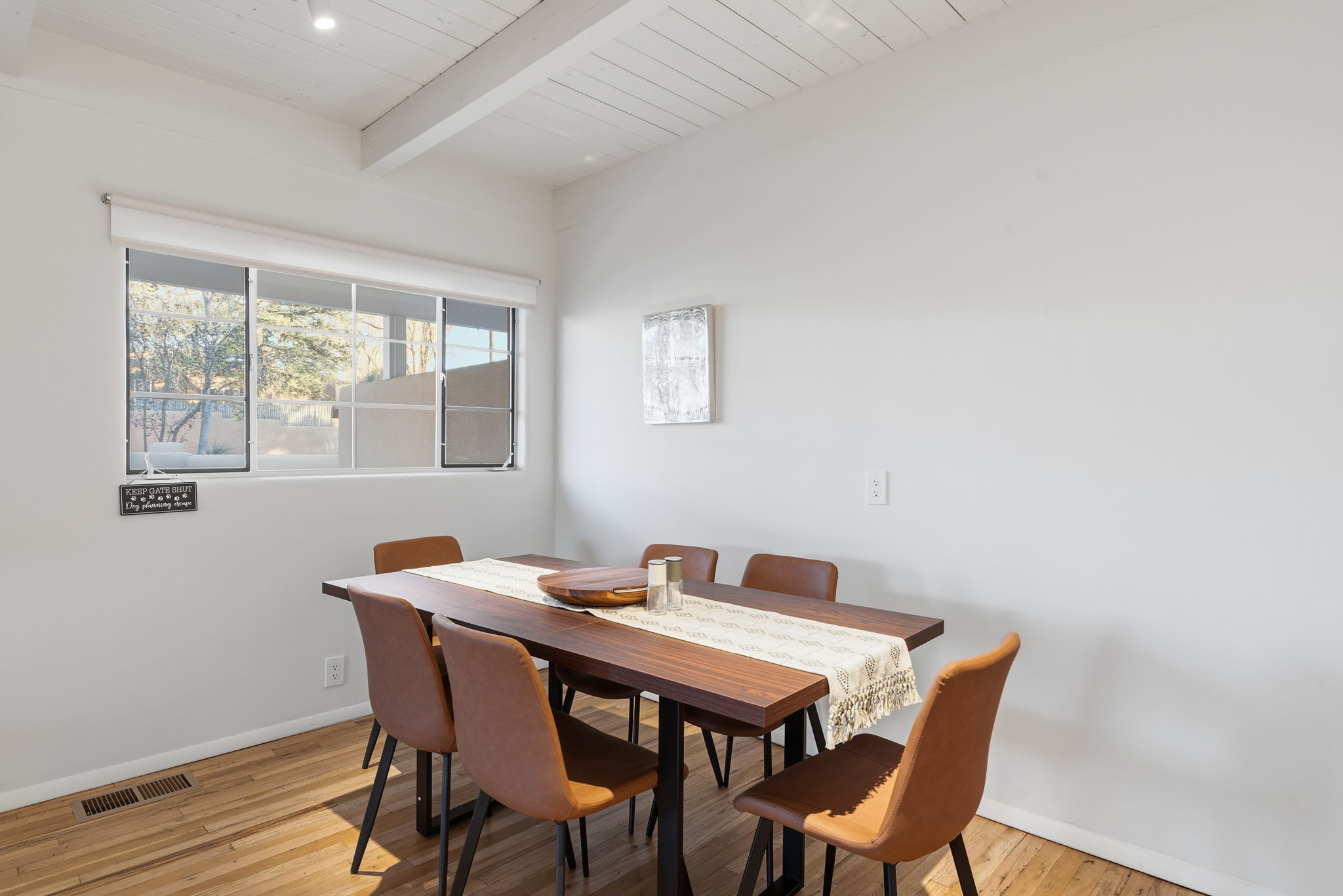 Bright kitchen with plenty of prep space and dining area just steps away