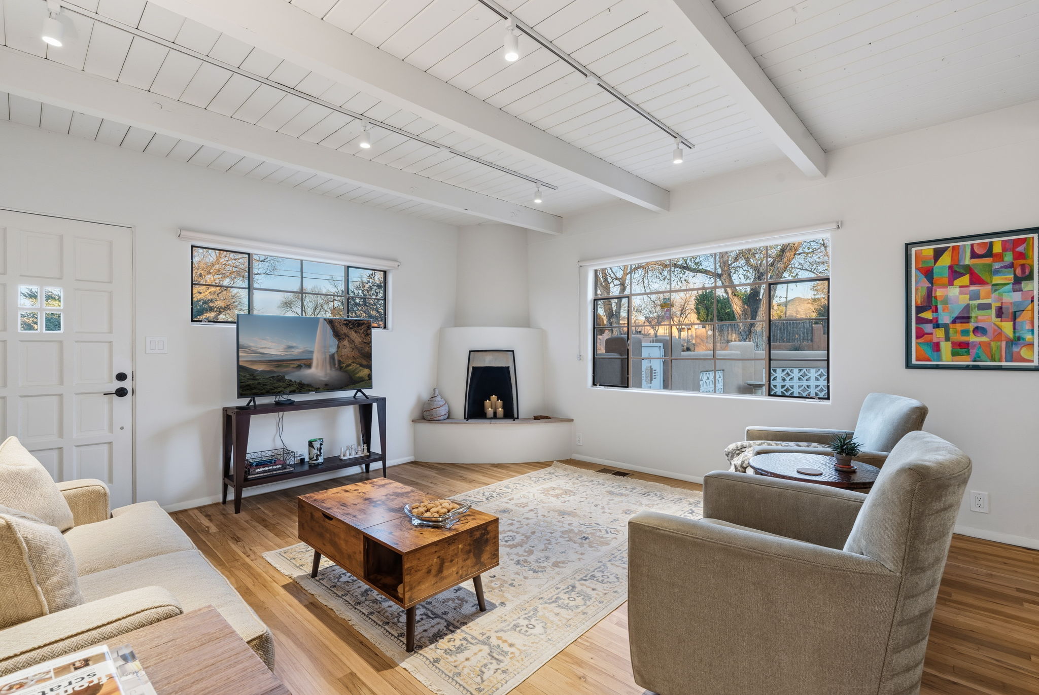 Bright, modern living space flooded with natural light through large windows