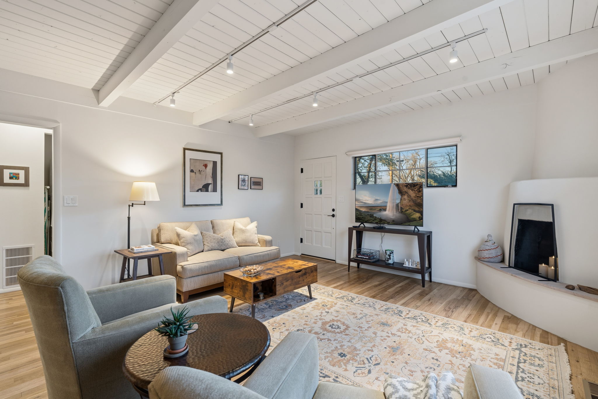 Cozy seating with Smart TV—perfect for relaxing after exploring Santa Fe''s galleries and museums