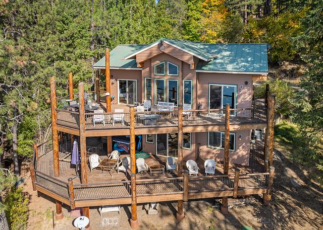 New Listing! The Ultimate CDA Lakehouse | Views, Private Dock & Decks 4