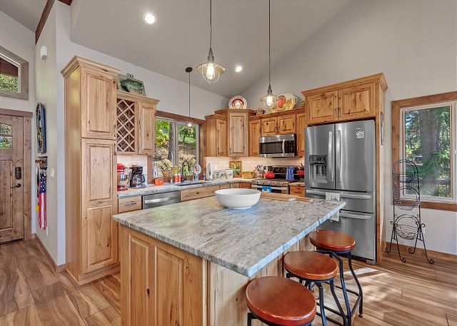 New Listing! The Ultimate CDA Lakehouse | Views, Private Dock & Decks 10