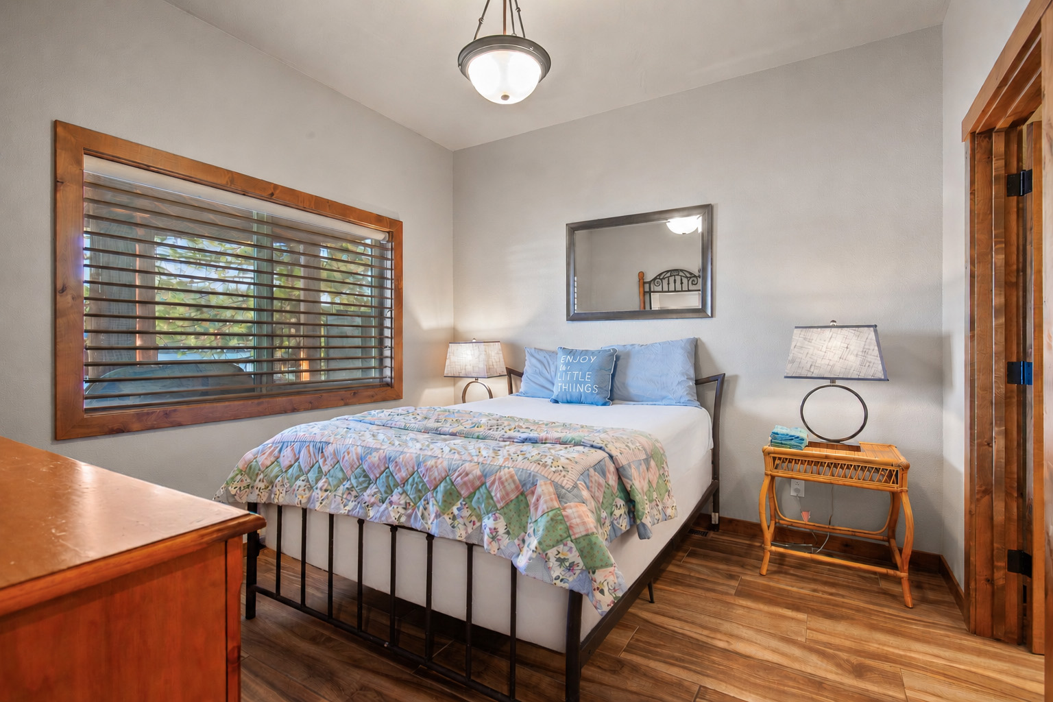 Relax and recharge in this cozy queen bedroom retreat.
