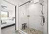 Enjoy the convenience of a walk-in shower in this well-appointed bathroom.
