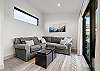 Second living room with plush seating 