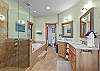 Primary Bathroom with soaking tub and walk-in shower