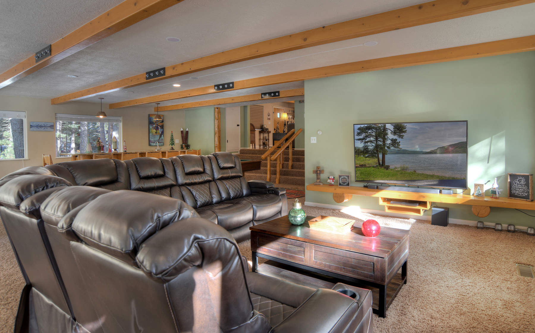 Cozy seating area made for movies, board games, and relaxing after a day outside.