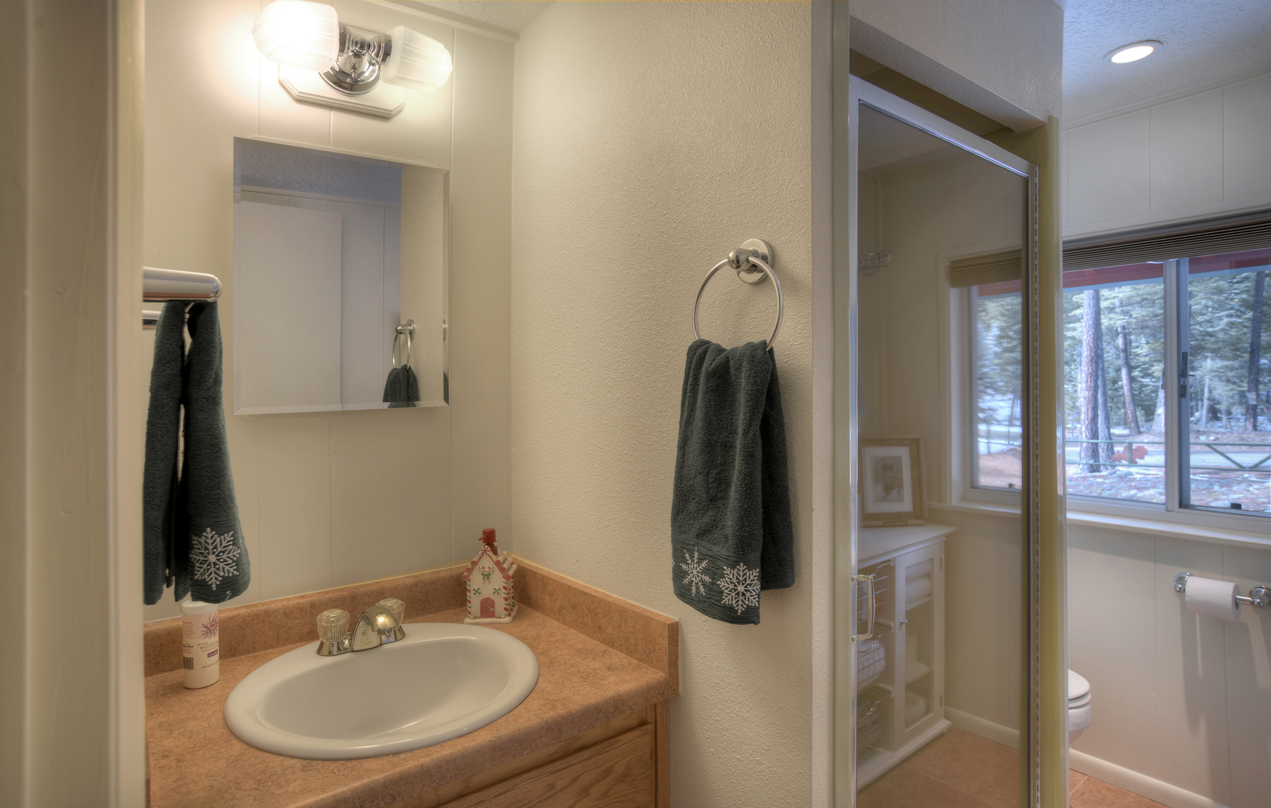 Full bathroom #3 is located in the hallway