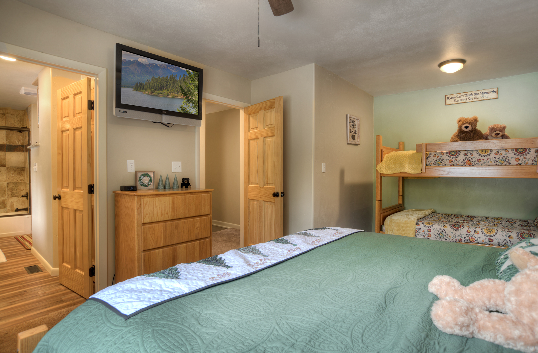 Ensuite bathroom view from Bedroom 2 with modern fixtures and natural lighting.