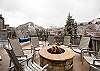 Gather around the community fire pit take in stunning views of Beaver Creek's world-famous ski slopes