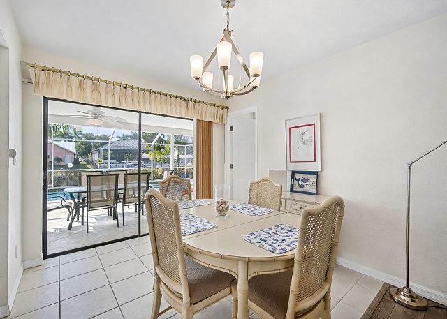 New Listing! Canalfront Comfort | Heated Pool, Patio & Palm-Lined Views 7