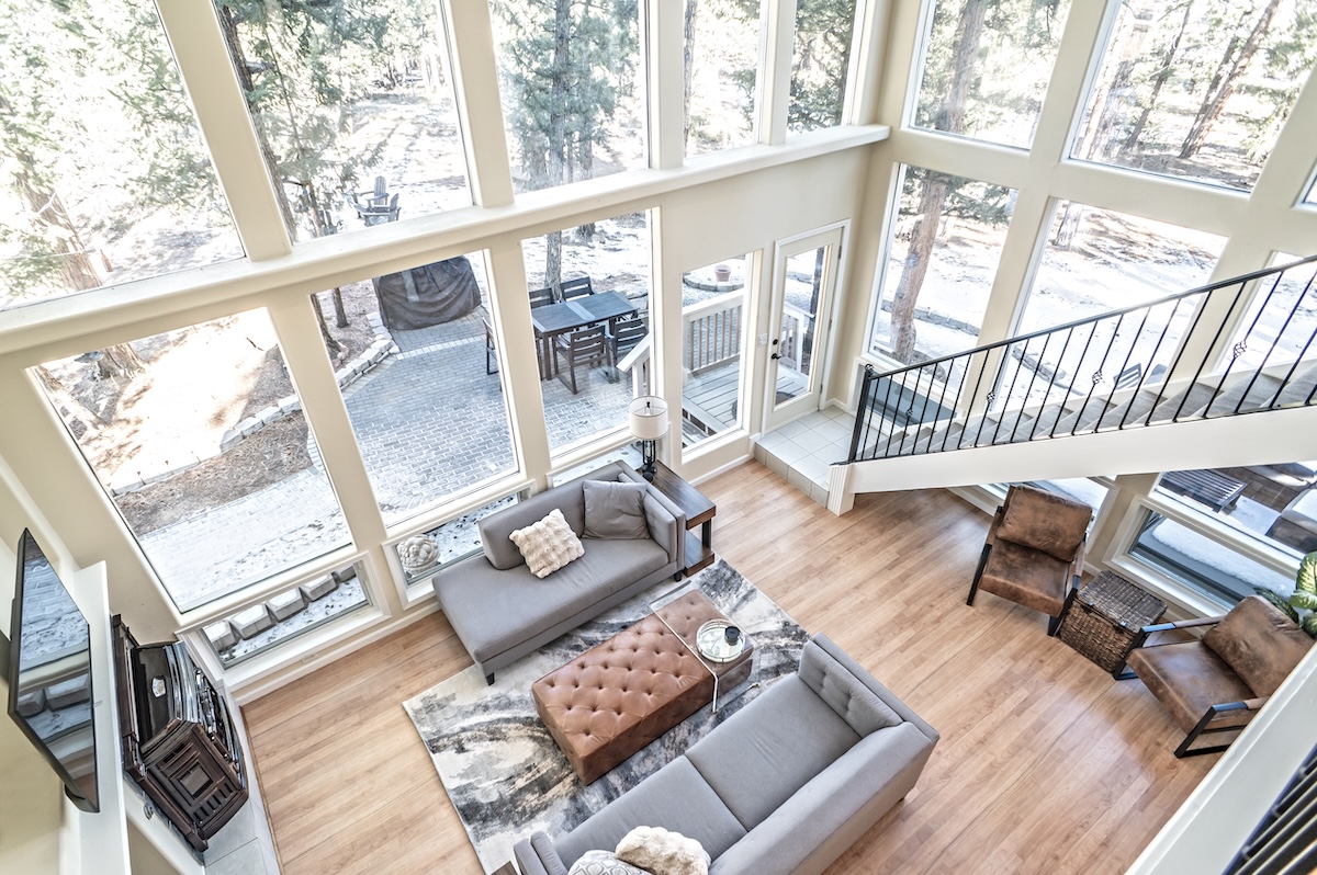 Large living room with floor-to-ceiling windows