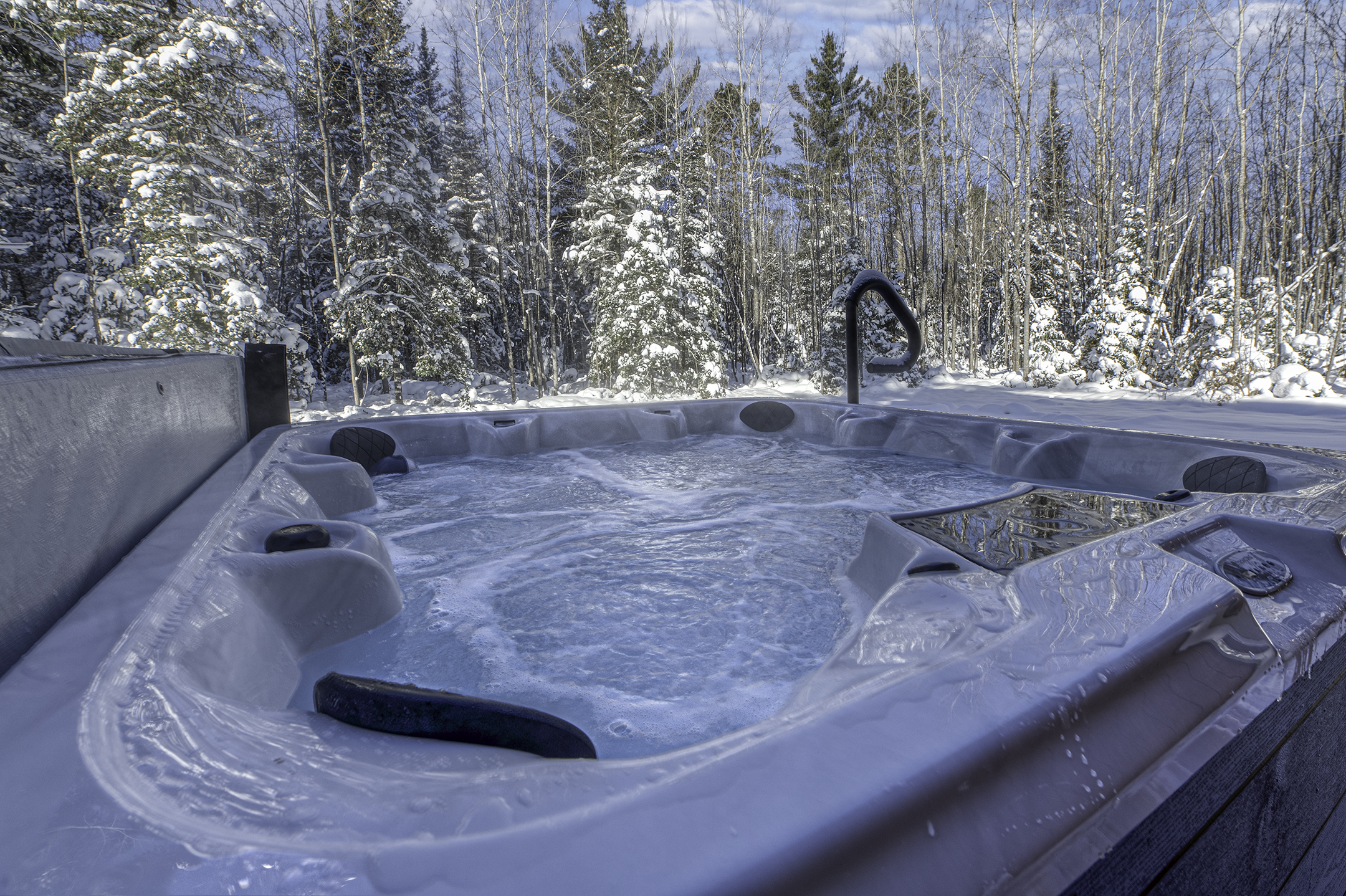 Sit back and relax in the hot tub on the Back Deck!