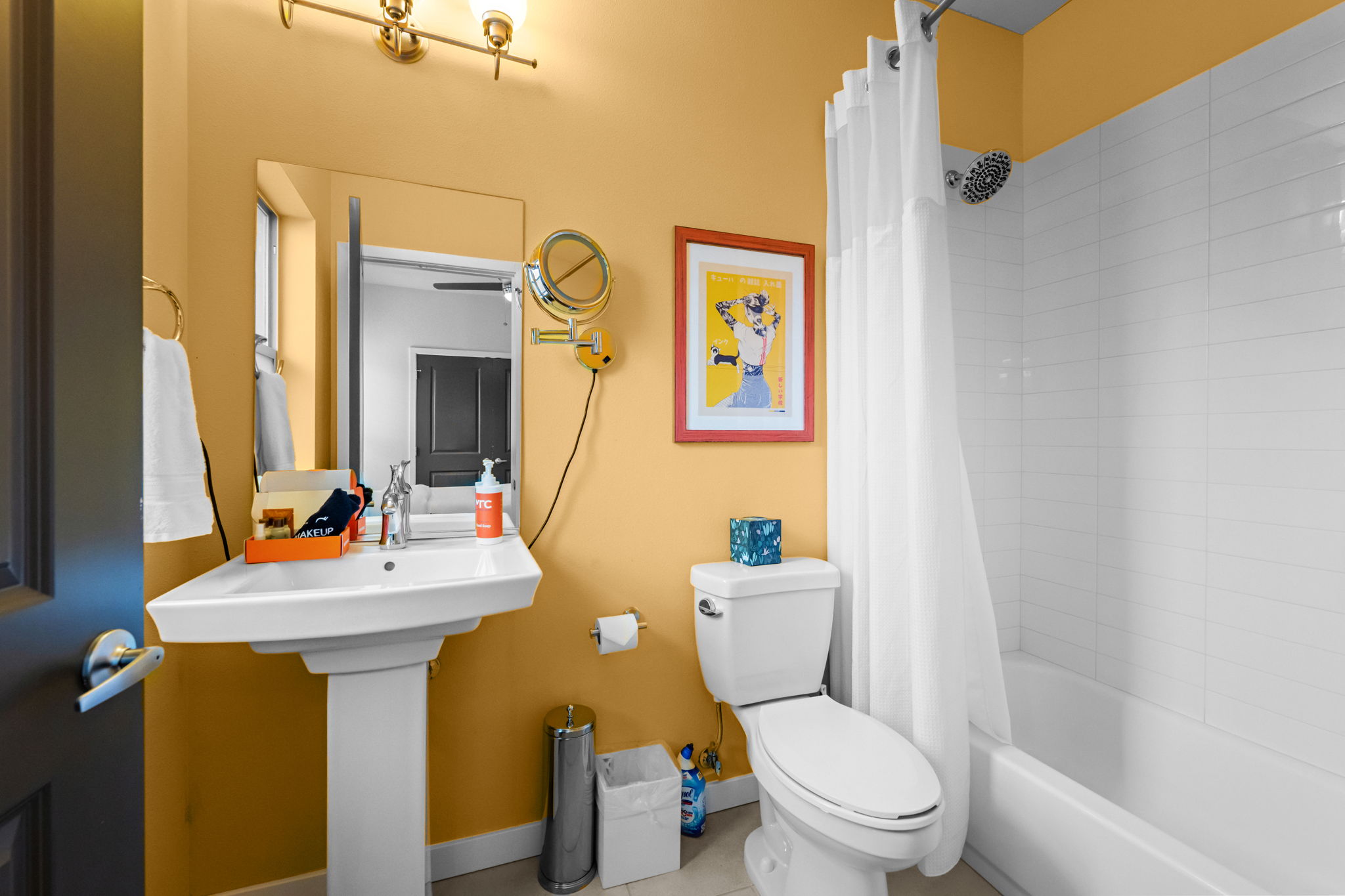 Bright bathroom with modern fixtures and colorful accents