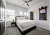 Third queen bedroom with ensuite walk-in shower—every bedroom has its own private bathroom