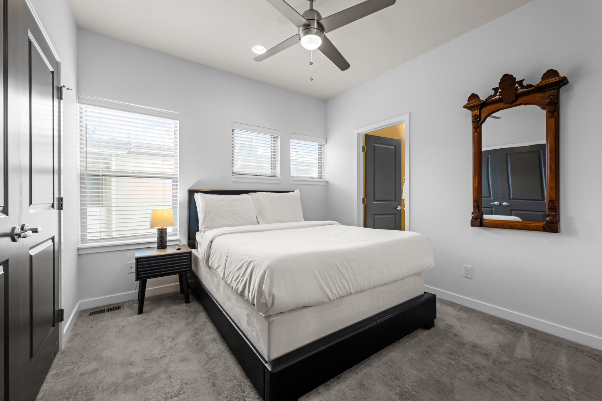 Third queen bedroom with ensuite walk-in shower—every bedroom has its own private bathroom