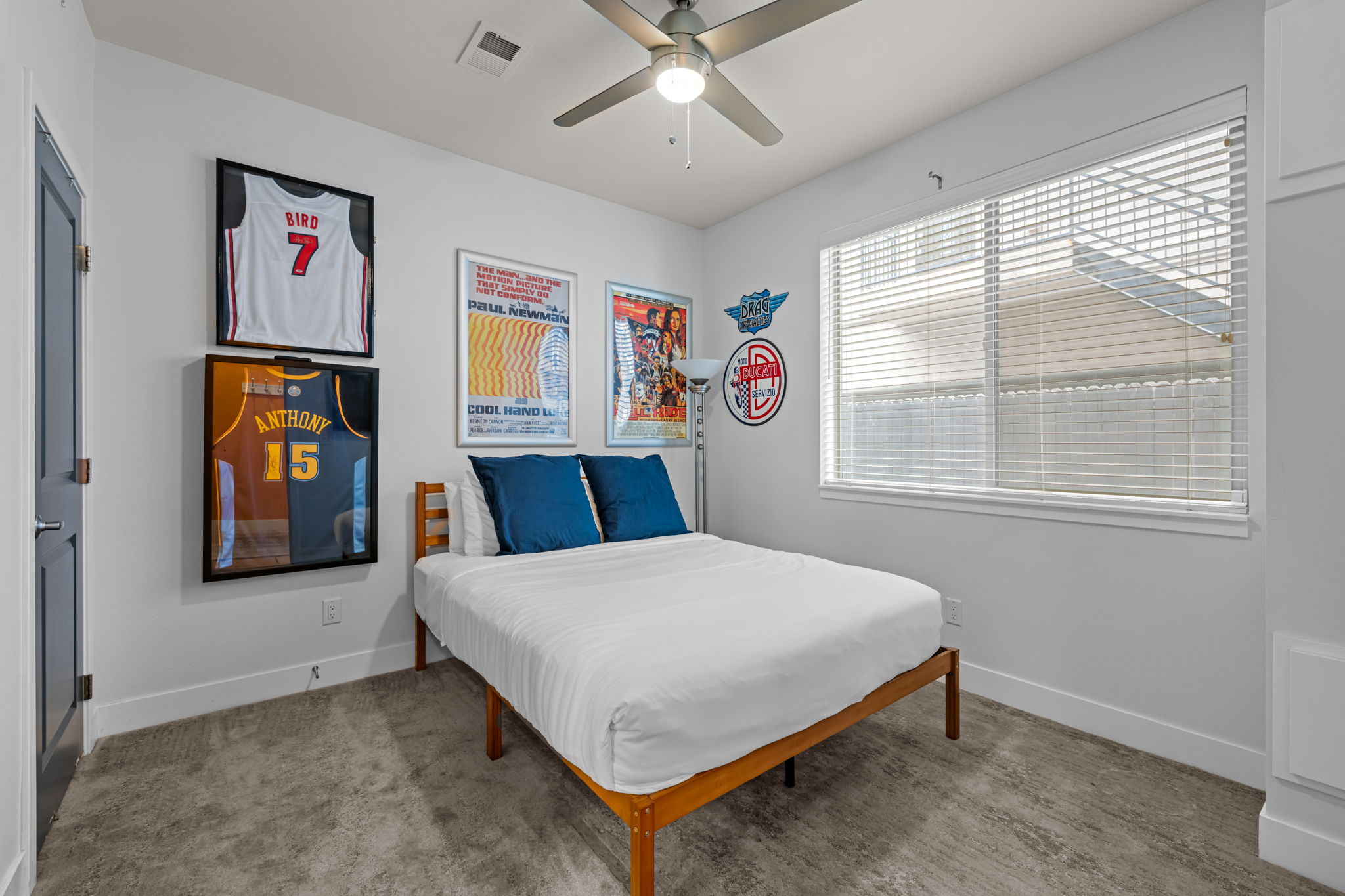 King bedroom with Smart TV and ensuite bathroom—spacious main floor primary suite