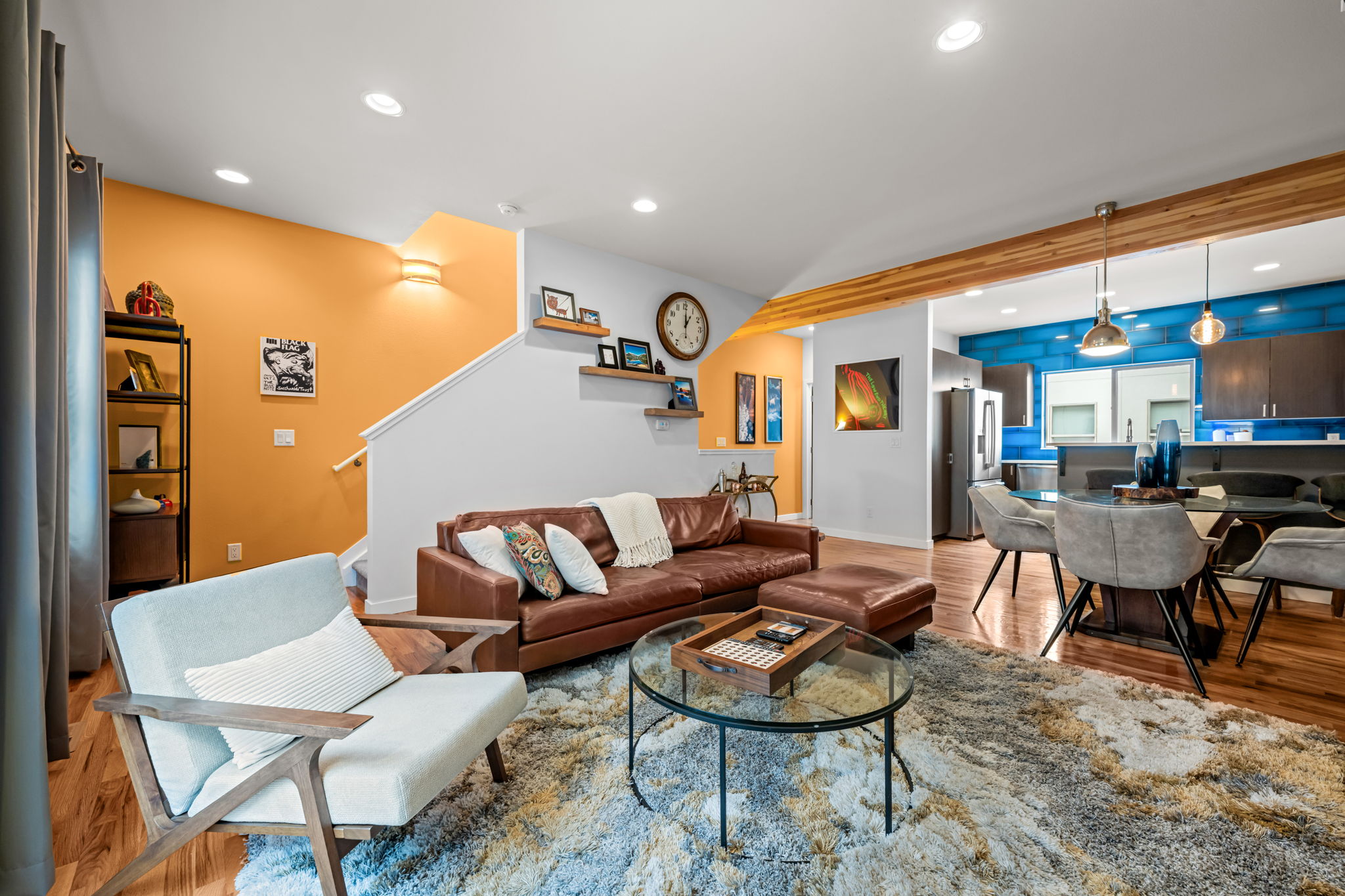 Contemporary living and dining space with abundant natural light—designed for long-term comfort