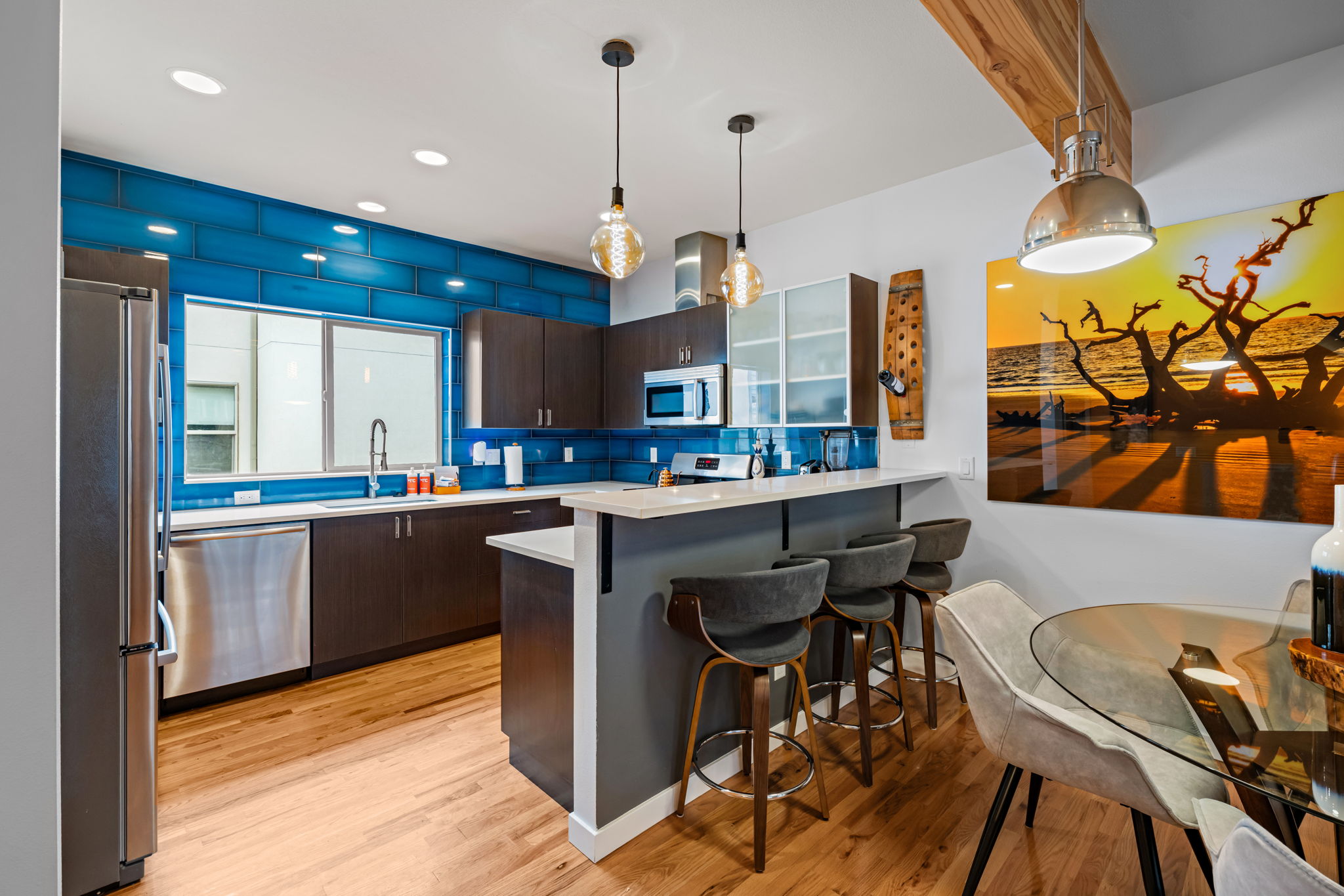 Well-equipped kitchen with granite counters and plenty of cabinet space