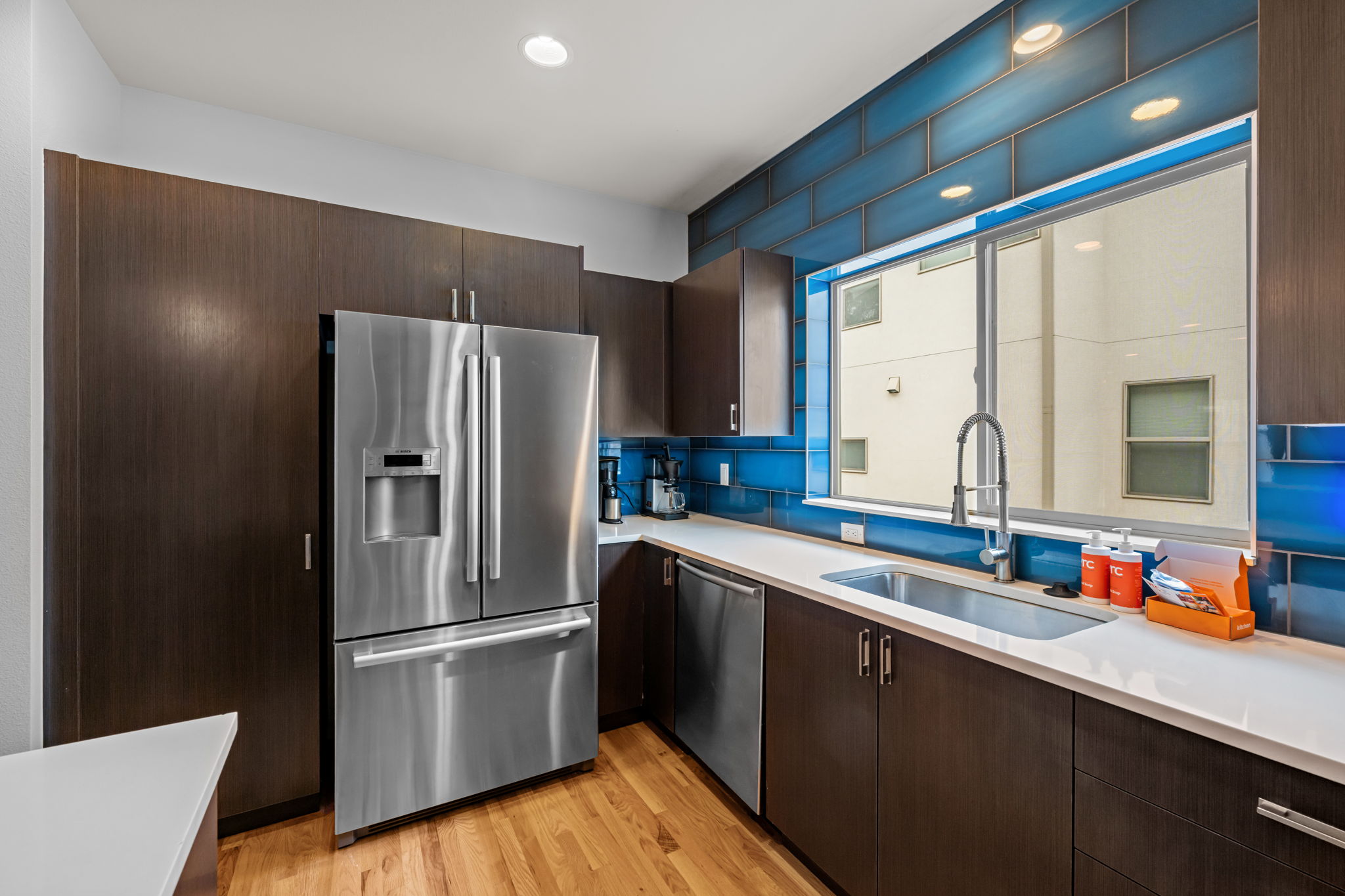 Modern kitchen with ample counter space and breakfast bar seating