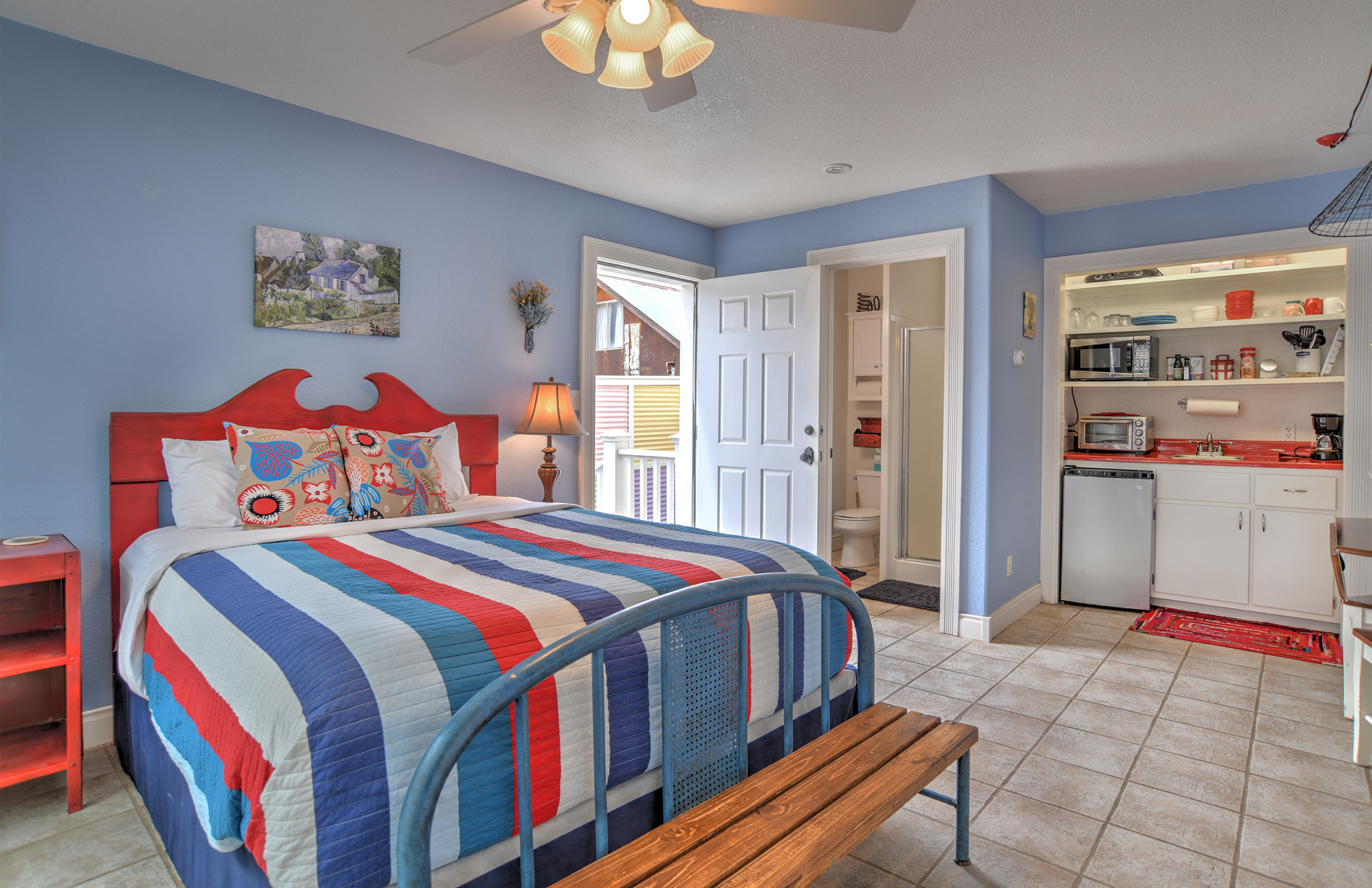 Unit 2, the Rosewood Studio, is a spacious studio featuring a separate living area from the bedroom and kitchenette area. This unit also includes a private bathroom and is conveniently located on the main floor.