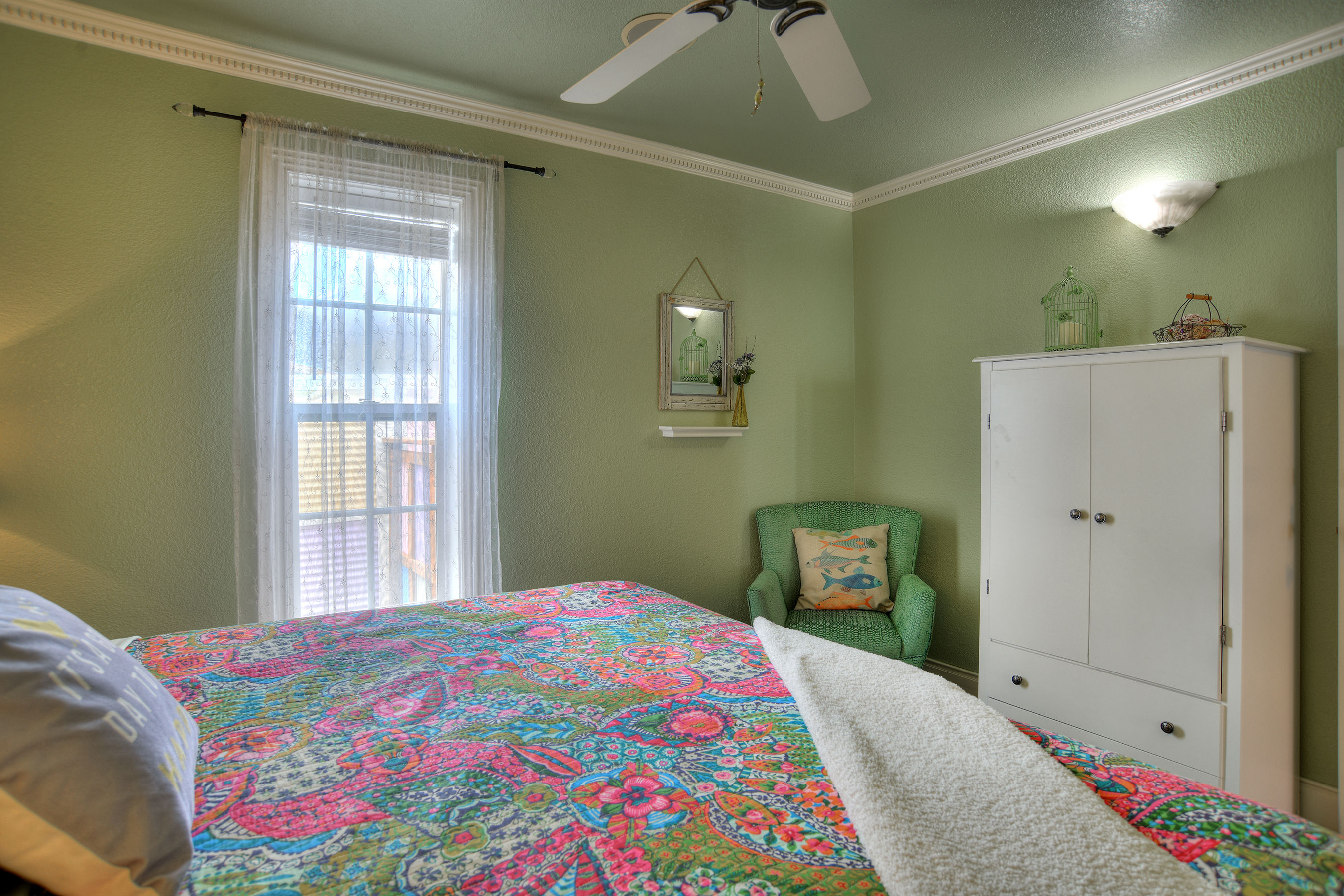 Main level bedroom with king bed. 