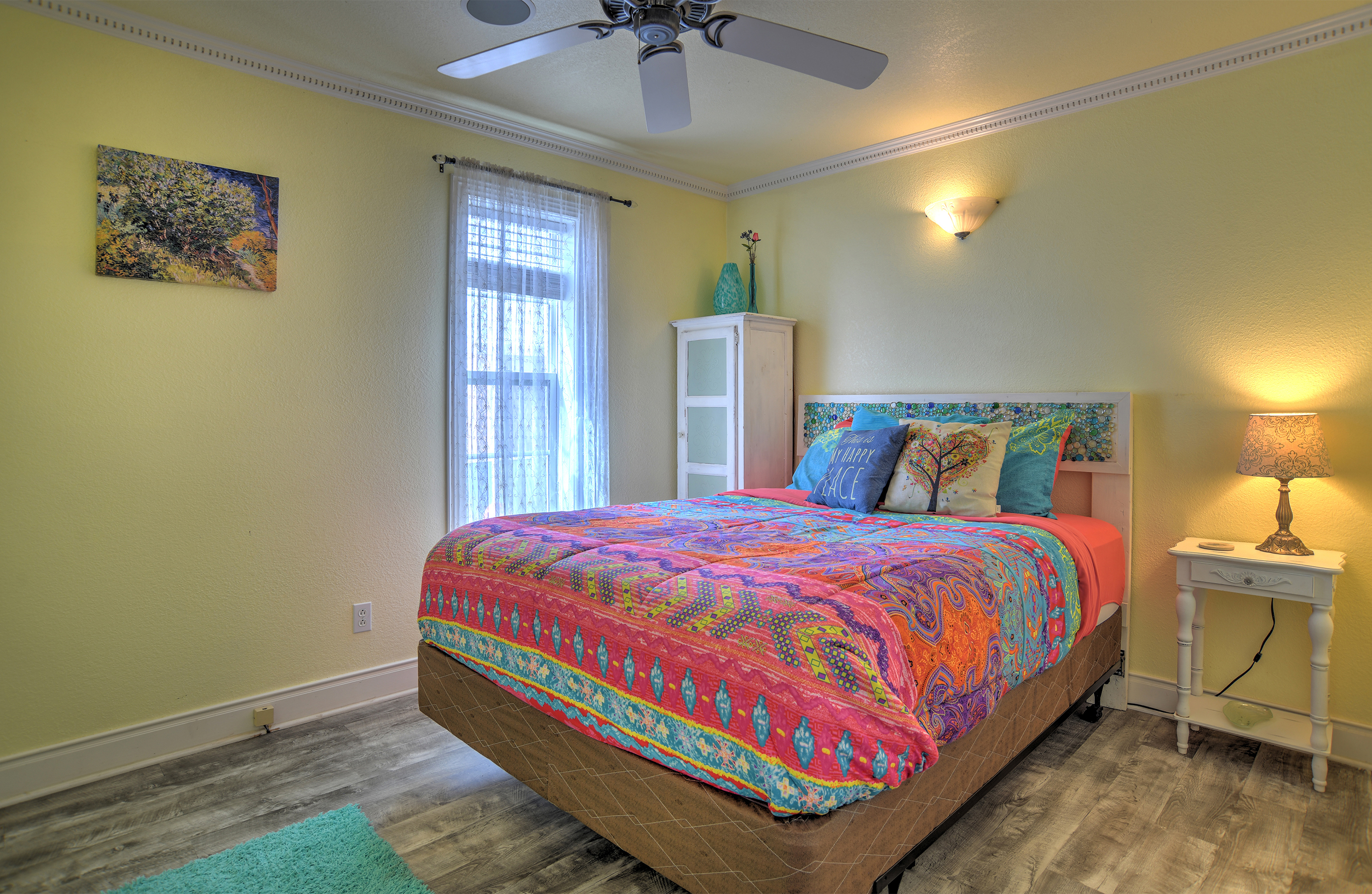 Main level second bedroom, queen bed.