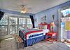 Main level studio bedroom with queen bed. 