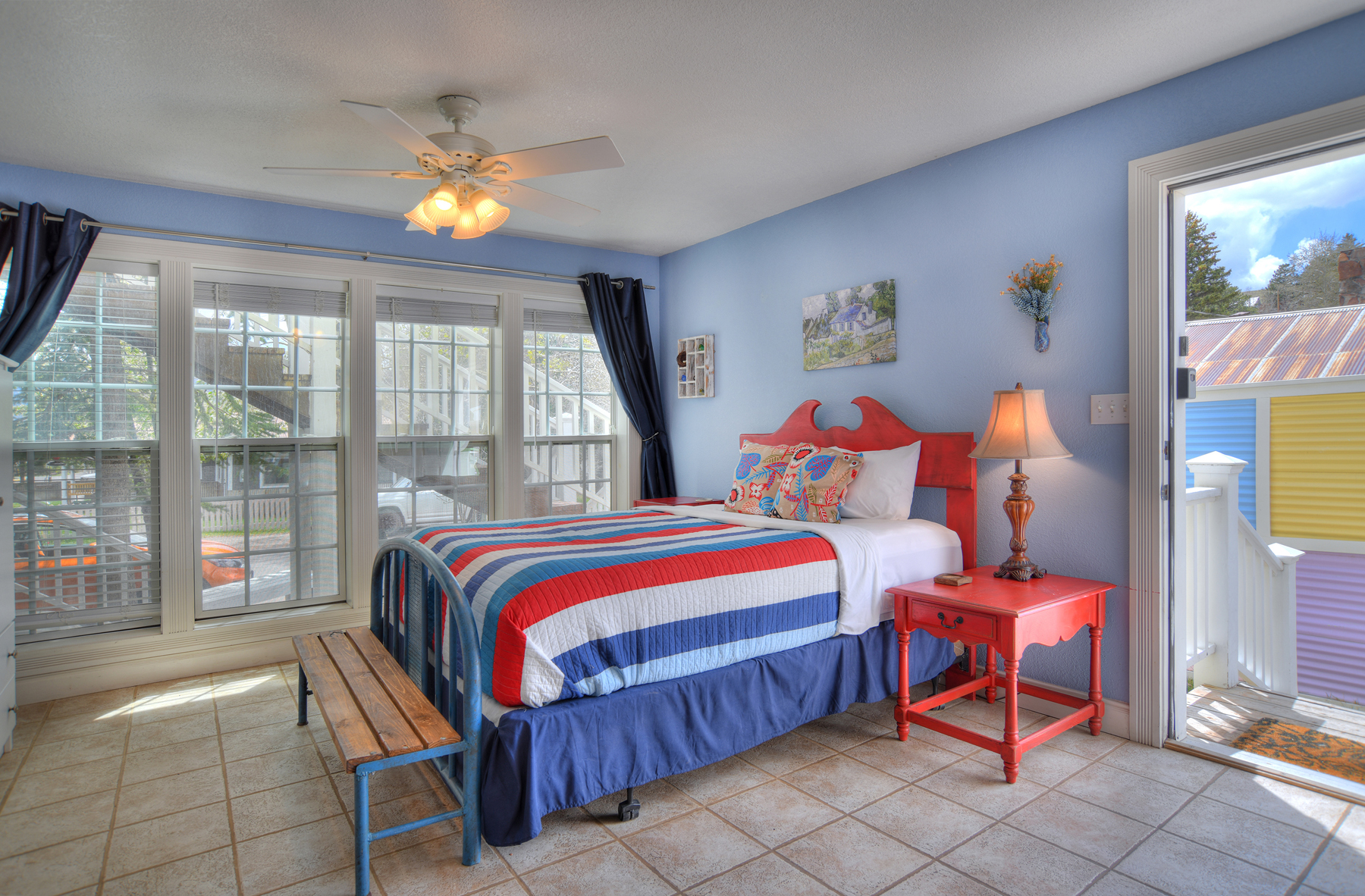 Main level studio bedroom with queen bed. 