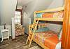 Bunk room with full-over-twin bunk bed, perfect for kids or friends.
