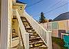 Exterior stairs leading up to the Roseview Suite on the second floor.