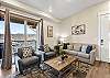 Comfortable seating area and large Smart TV for movie nights after a day in the desert.