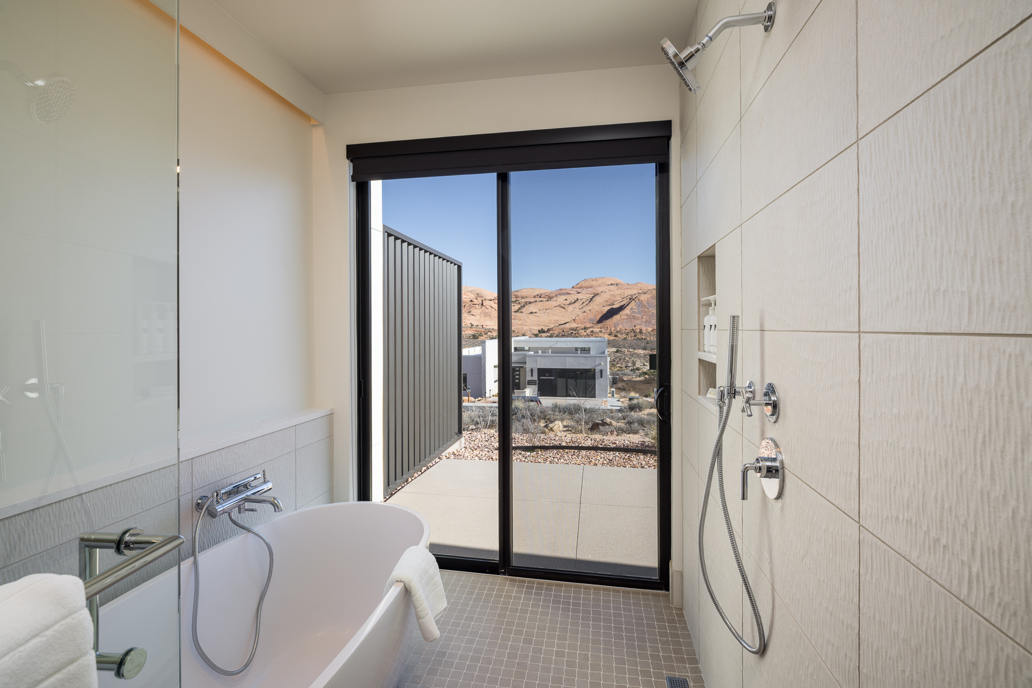 Fresh and functional full bathroom with a walk-in shower and contemporary design.
