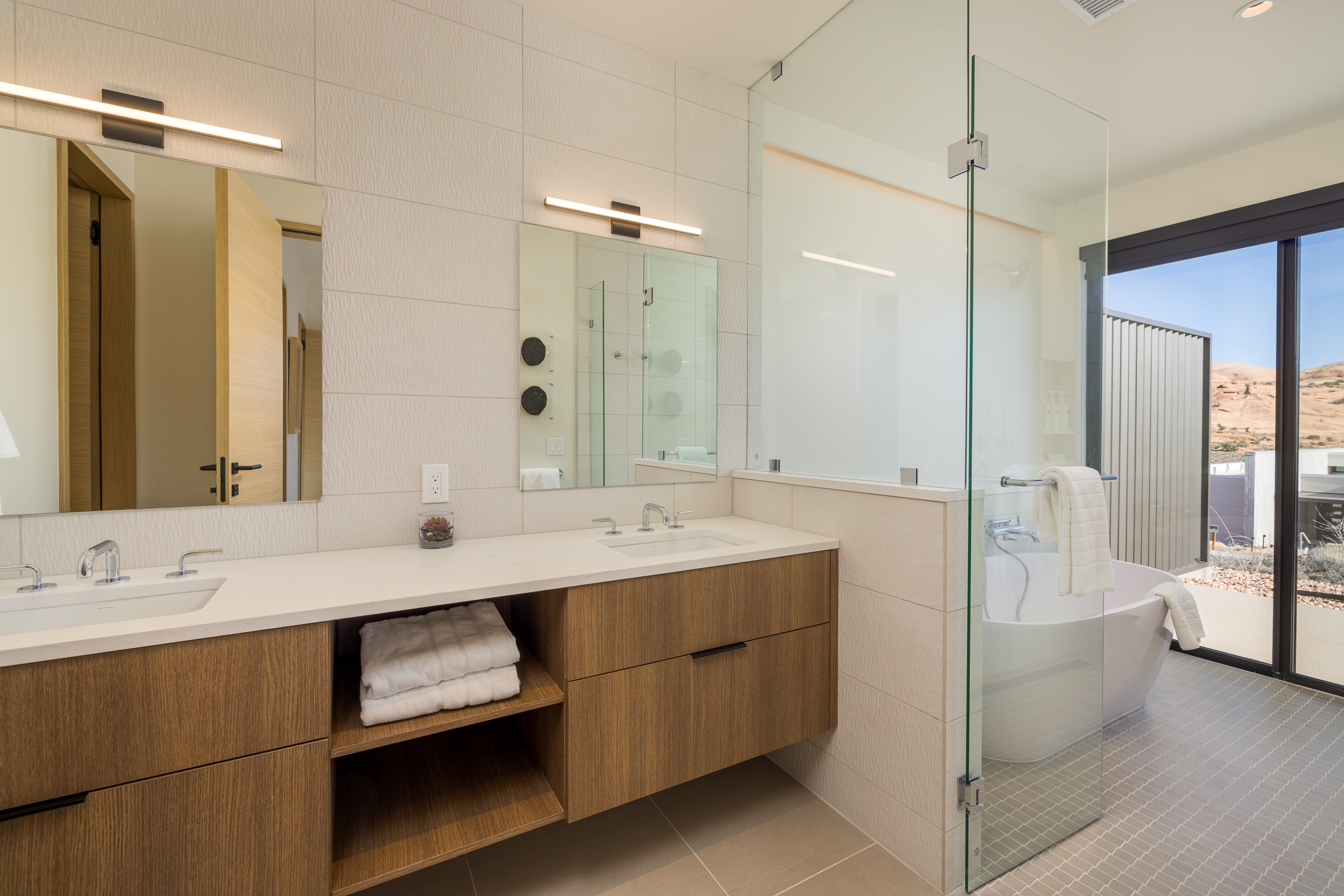 Enjoy the convenience of a walk-in shower & soaking tub in this luxury bathroom.
