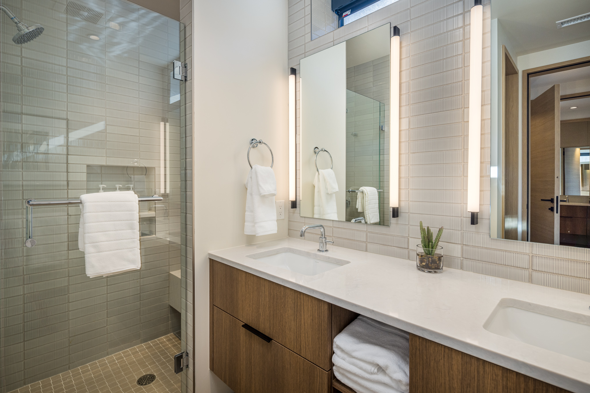 Ensuite Full bathroom featuring a sleek walk-in shower.
