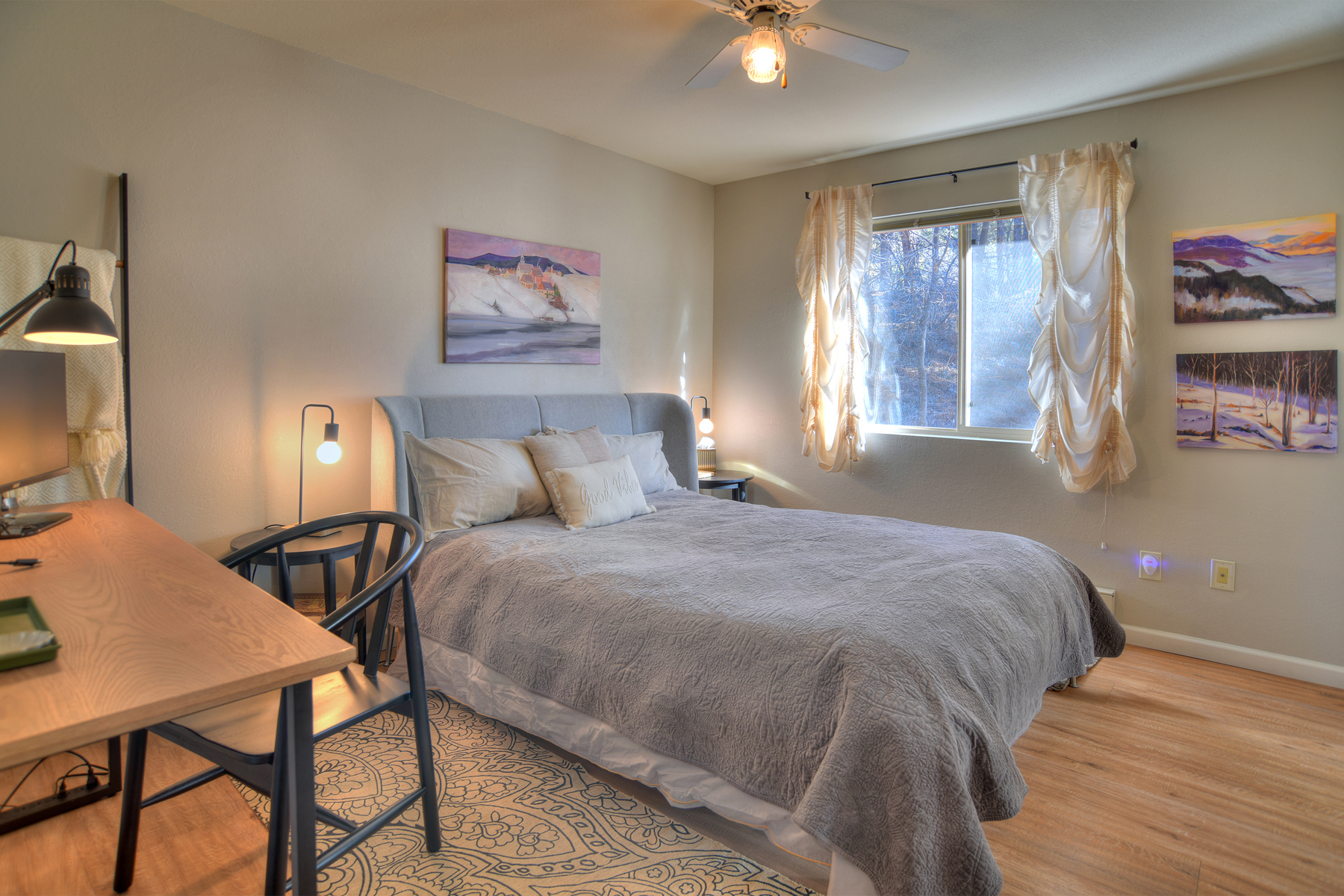 Bedroom 1 with comfortable queen bed and modern decor – a peaceful retreat for restful sleep after your Colorado adventures.