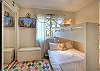Bunk bedroom with desk area and Smart TV – perfect for families with kids or remote workers who need a dedicated workspace.