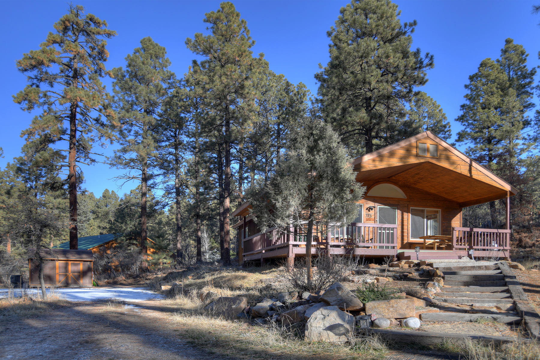 Welcome to Forest Lake Cabin – your cozy mountain retreat tucked away on 1.3 acres of peaceful forested land, surrounded by towering pines and fresh Colorado air.