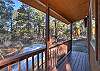 Private deck surrounded by towering pines – enjoy outdoor living with BBQ grill, seating, and the peaceful sounds of the Colorado forest.