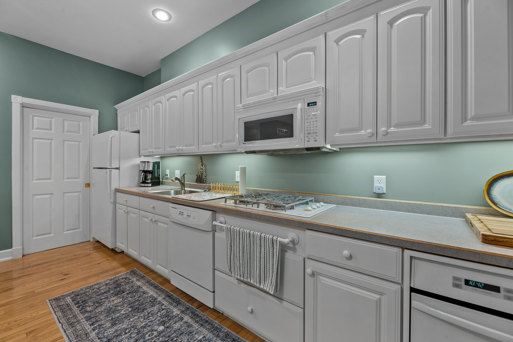 Fully-equipped modern kitchen with stainless appliances, ample counter space, and everything you need to prepare delicious meals during your stay.
