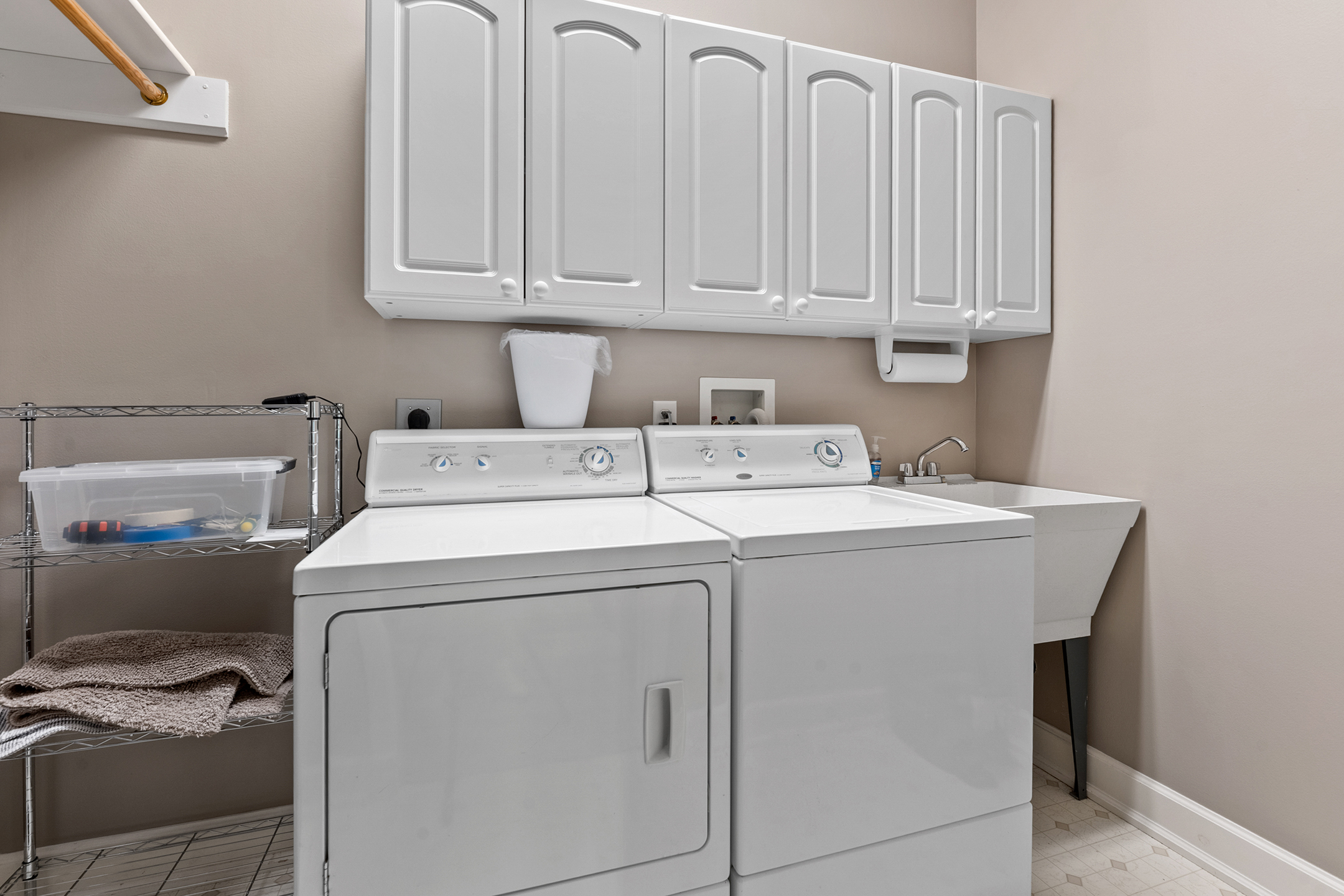 Laundry room with washer and dryer – convenient for keeping clothes fresh during extended stays at the lake.