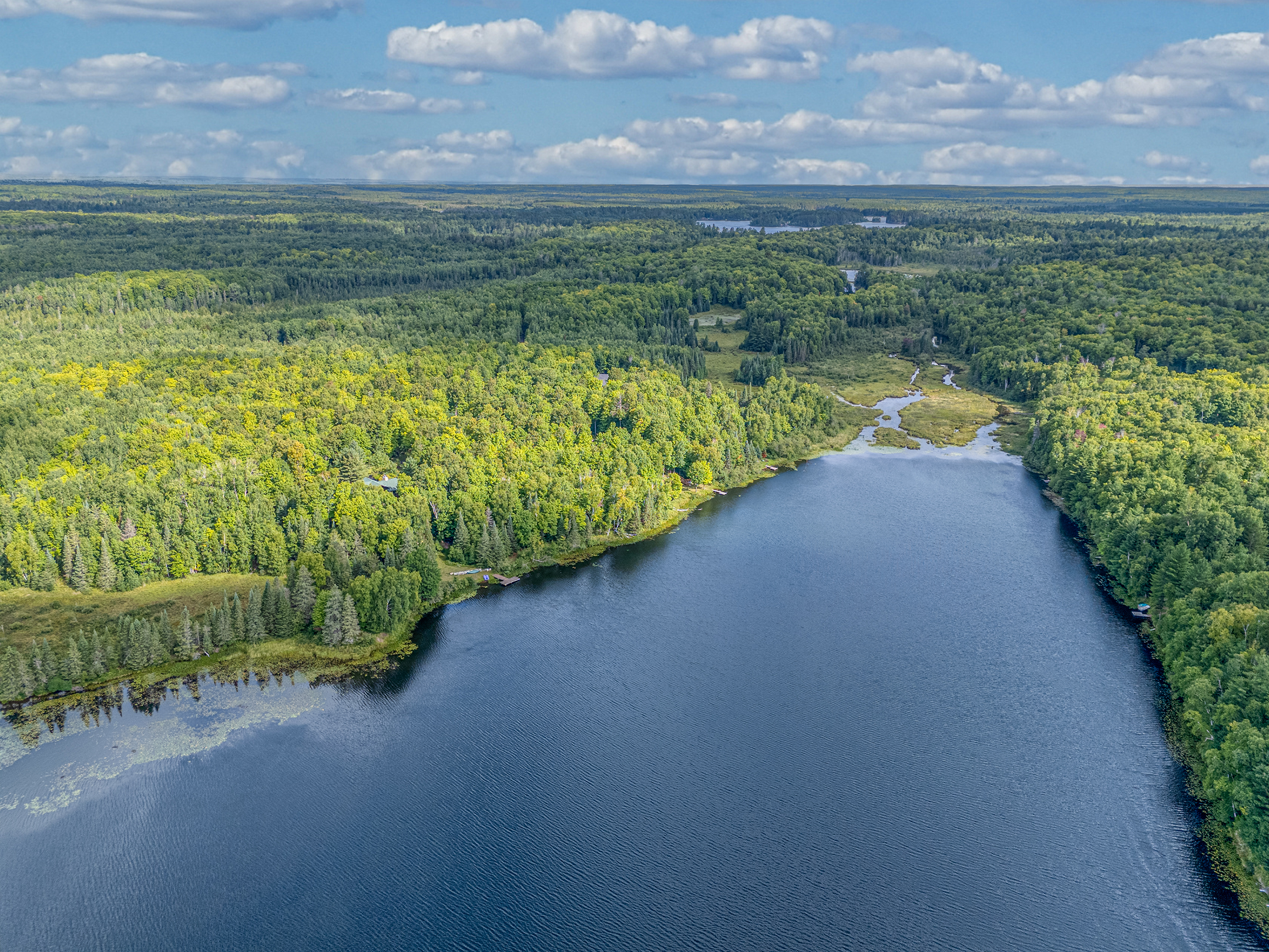 Panoramic aerial view of the crystal-clear lake – discover the pristine beauty of Little Martha Lake, perfect for fishing and quiet water sports.