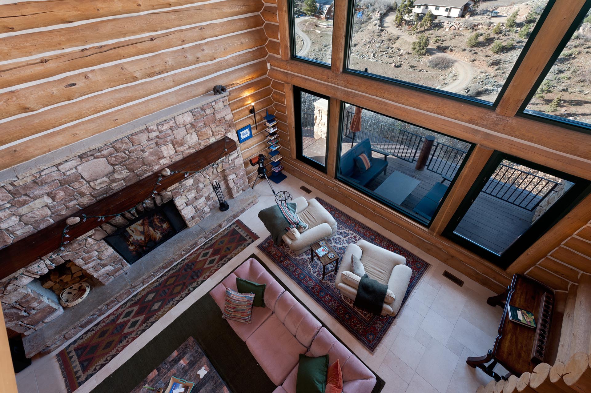 Main Living Space - Wood burning fireplace (wood provided) and amazing views through the picture windows